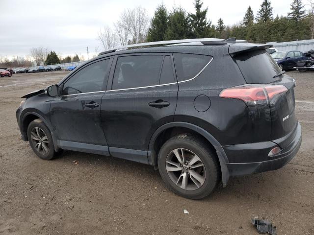 Photo 2 from auction – 2018 TOYOTA RAV4 LE with VIN 2T3BFREV0JW778568