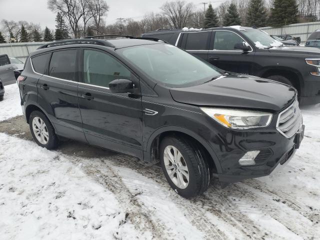 Photo 4 from auction – 2018 FORD ESCAPE SE with VIN 1FMCU9GD9JUA59942