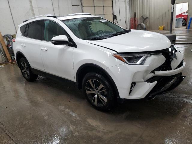 Photo 4 from auction – 2016 TOYOTA RAV4 XLE with VIN 2T3RFREVXGW464563