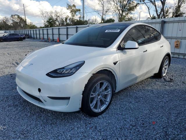 TESLA MODEL Y 2021 with VIN 5YJYGDEE6MF087212 - Photo from auction