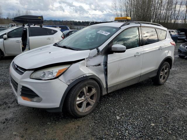 FORD ESCAPE SE 2014 with VIN 1FMCU9GX8EUA71502 - Photo from auction