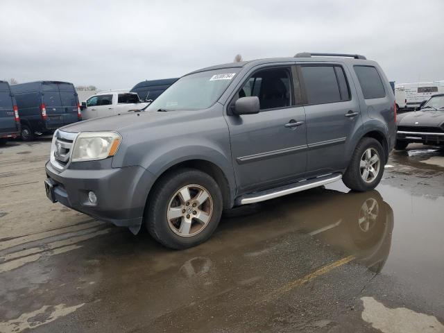 HONDA PILOT EX 2011 with VIN 5FNYF4H45BB102611 - Photo from auction