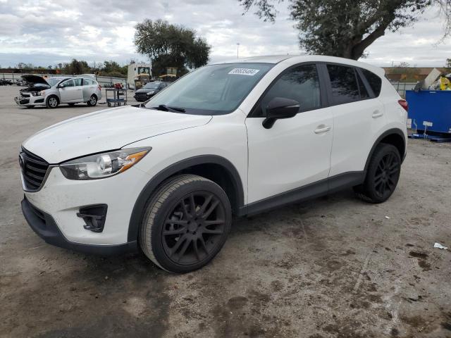 MAZDA CX-5 GT 2016 with VIN JM3KE4DY4G0879652 - Photo from auction