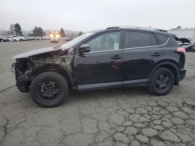 TOYOTA RAV4 LE 2018 with VIN 2T3ZFREV7JW449932 - Photo from auction