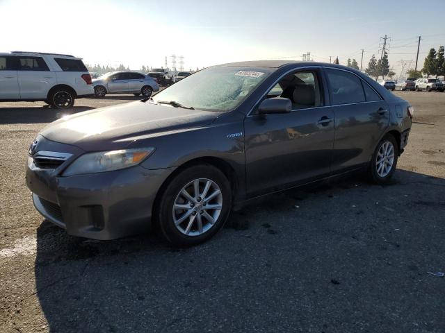 TOYOTA CAMRY HYBR 2011 with VIN 4T1BB3EK9BU129165 - Photo from auction