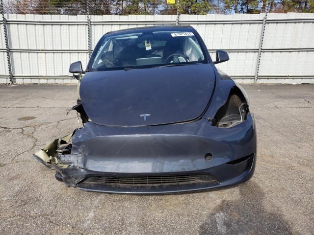 Photo 5 from auction – 2023 TESLA MODEL Y with VIN 7SAYGDEE8PA103706