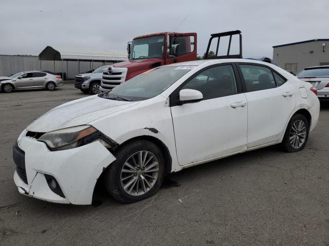 TOYOTA COROLLA L 2014 with VIN 5YFBURHEXEP103523 - Photo from auction