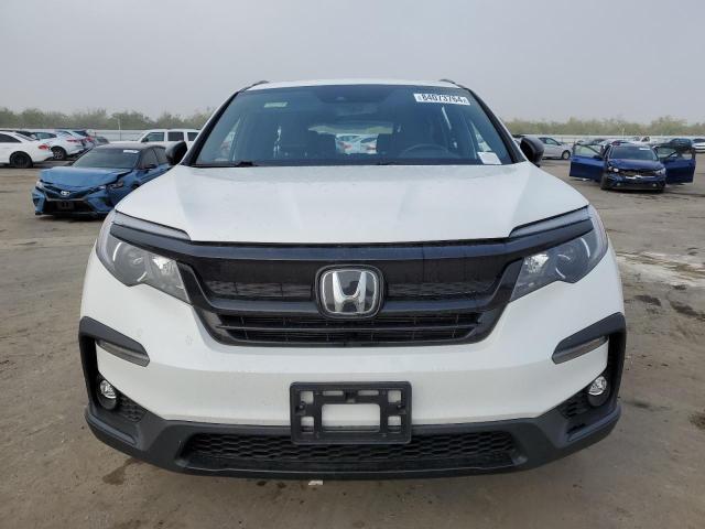 Photo 5 from auction – 2022 HONDA PILOT TRAI with VIN 5FNYF6H83NB077596