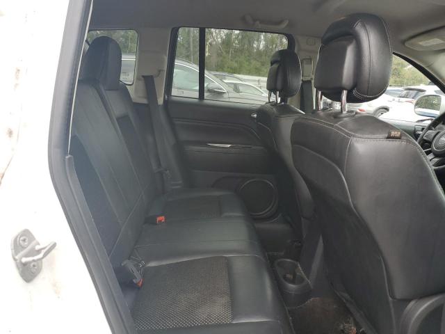 Photo 11 from auction – 2014 JEEP COMPASS LA with VIN 1C4NJCEA2ED643083
