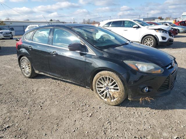 Photo 4 from auction – 2014 FORD FOCUS TITA with VIN 1FADP3N23EL358617