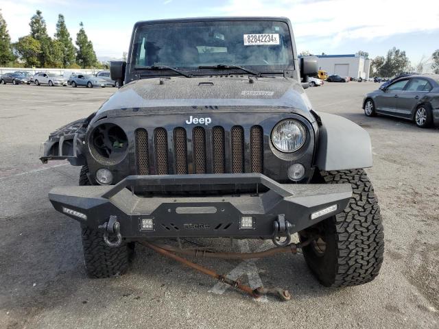 Photo 5 from auction – 2016 JEEP WRANGLER U with VIN 1C4BJWDG9GL114913