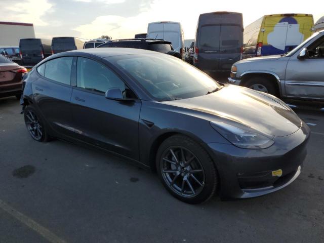 Снимка 4 от търг – 2022 TESLA MODEL 3 с VIN 5YJ3E1EB2NF121989