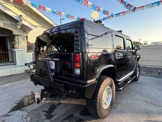 Photo 4 from auction – 2003 HUMMER H2 with VIN 5GRGN23U23H145183