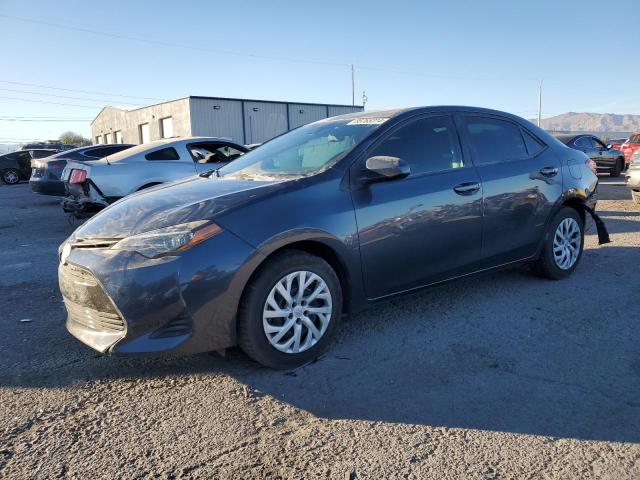 TOYOTA COROLLA L 2019 with VIN 5YFBURHE3KP881156 - Photo from auction