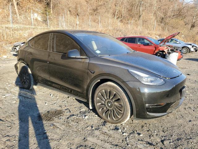 Photo 4 from auction – 2023 TESLA MODEL Y with VIN 7SAYGAEE2PF922177
