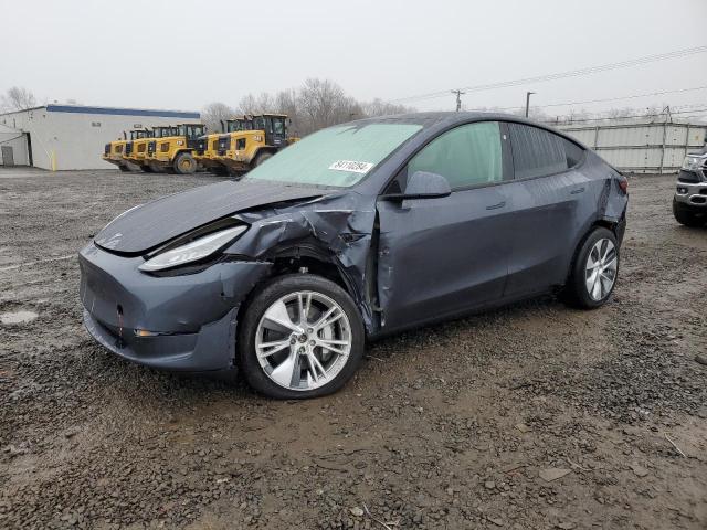 TESLA MODEL Y 2023 with VIN 7SAYGDEE4PA136525 - Photo from auction