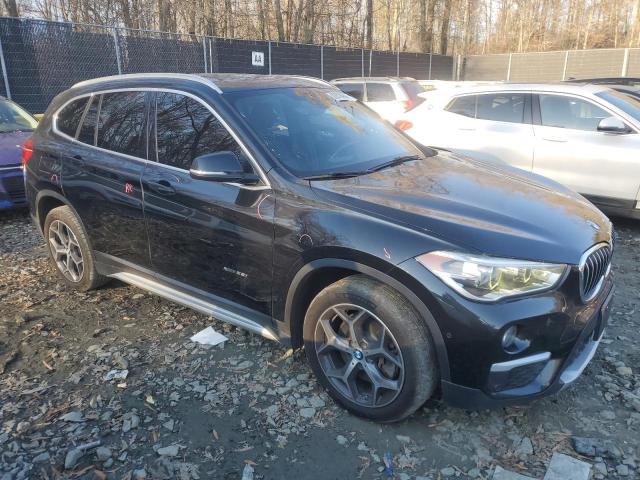 Photo 4 from auction – 2017 BMW X1 XDRIVE2 with VIN WBXHT3C31H5F68974
