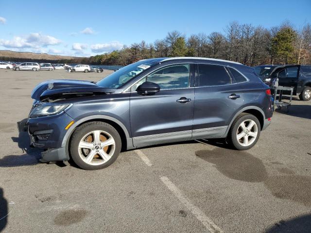LINCOLN MKC 2015 with VIN 5LMCJ2A97FUJ27910 - Photo from auction