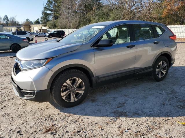 HONDA CR-V LX 2017 with VIN 7FARW5H31HE003251 - Photo from auction