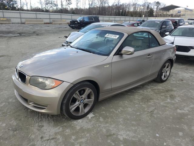 BMW 128 I 2010 with VIN WBAUL7C53AVJ77295 - Photo from auction