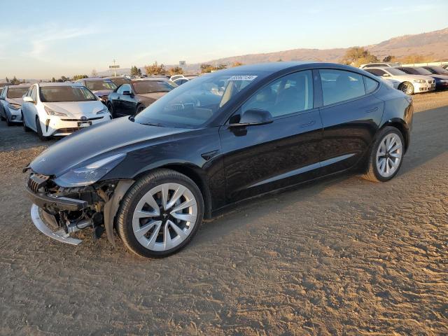 TESLA MODEL 3 2022 with VIN 5YJ3E1EB0NF130660 - Photo from auction