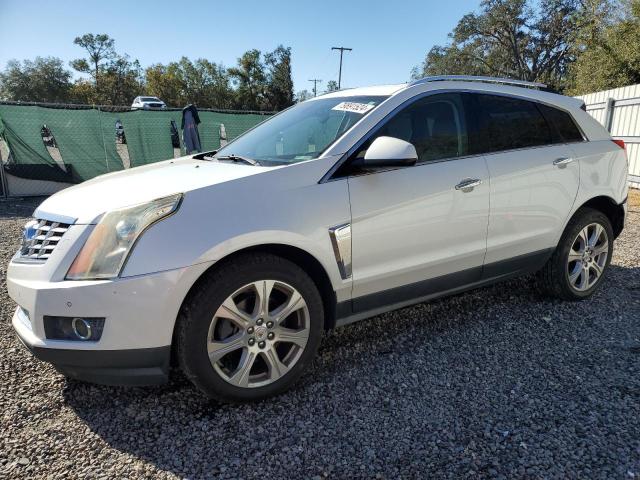 CADILLAC SRX PERFOR 2014 with VIN 3GYFNCE33ES677697 - Photo from auction