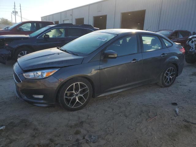 FORD FOCUS SE 2015 with VIN 1FADP3F21FL360916 - Photo from auction