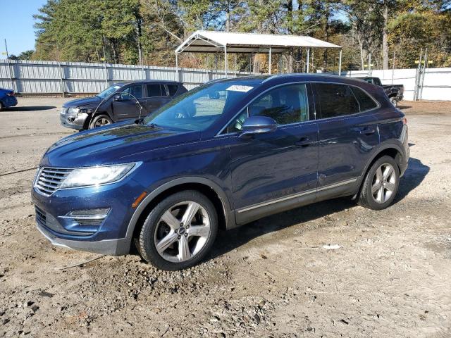 LINCOLN MKC 2015 with VIN 5LMCJ1A91FUJ07517 - Photo from auction