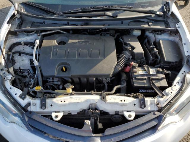 Photo 11 from auction – 2015 TOYOTA COROLLA L with VIN 5YFBURHE5FP244145