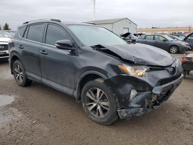 Photo 4 from auction – 2018 TOYOTA RAV4 LE with VIN 2T3BFREV0JW778568