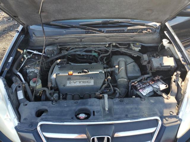 Photo 12 from auction – 2005 HONDA CR-V SE with VIN JHLRD78975C026174