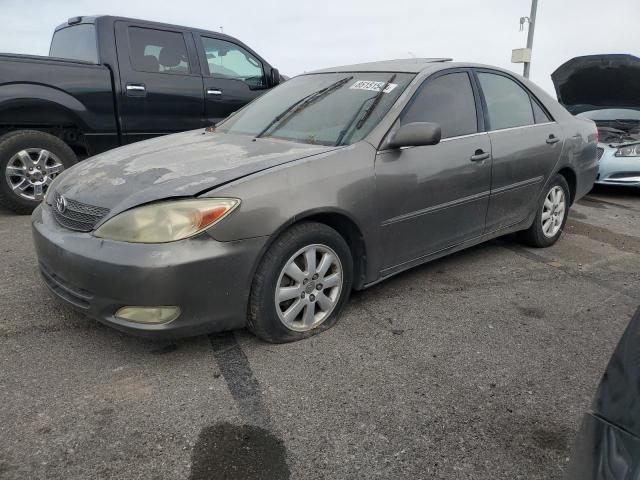 TOYOTA CAMRY LE 2003 with VIN 4T1BF32K63U561383 - Photo from auction