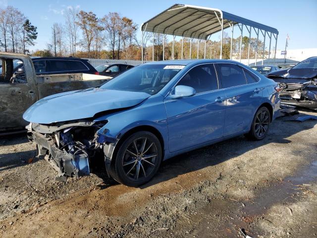 TOYOTA CAMRY LE 2015 with VIN 4T1BF1FK0FU887425 - Photo from auction