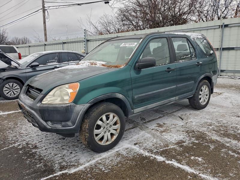 HONDA CR-V LX 2002 with VIN JHLRD684X2C024011 - Photo from auction