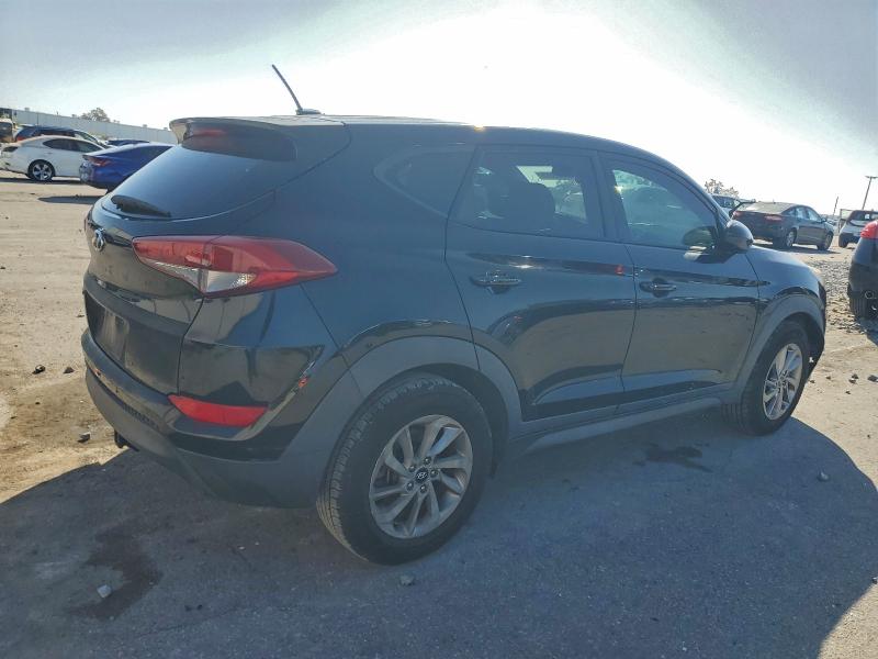 Photo 3 from auction – 2016 HYUNDAI TUCSON SE with VIN KM8J23A45GU161542