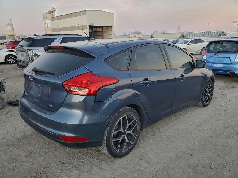 Photo 3 from auction – 2018 FORD FOCUS SEL with VIN 1FADP3M26JL312047