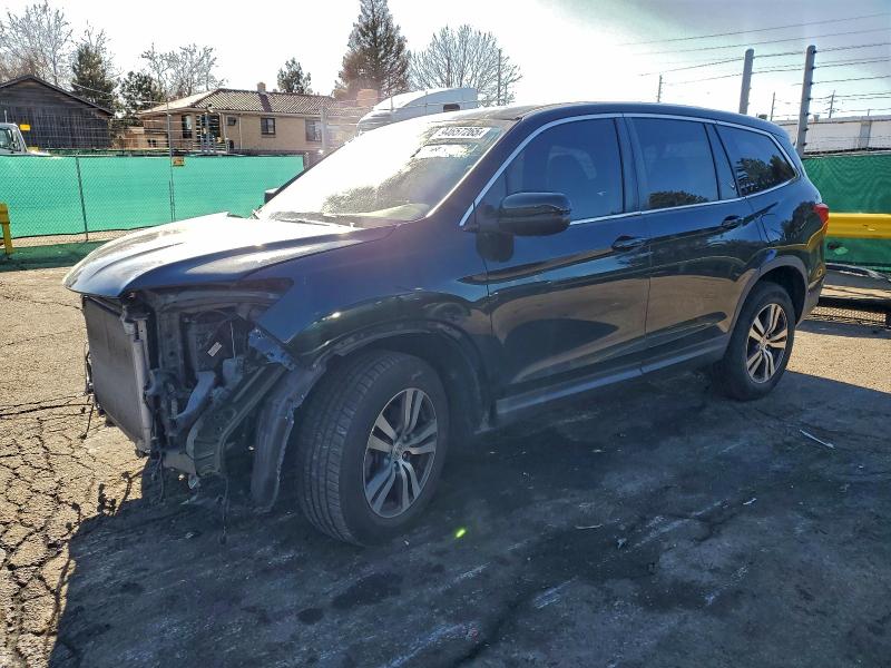 HONDA PILOT EXL 2016 with VIN 5FNYF6H58GB026037 - Photo from auction