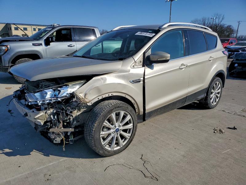 FORD ESCAPE TIT 2017 with VIN 1FMCU0J91HUD94767 - Photo from auction
