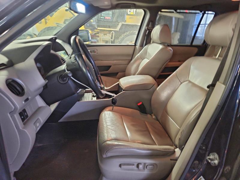 Фото 7 с аукциона – 2011 HONDA PILOT TOUR с VIN 5FNYF4H95BB011091