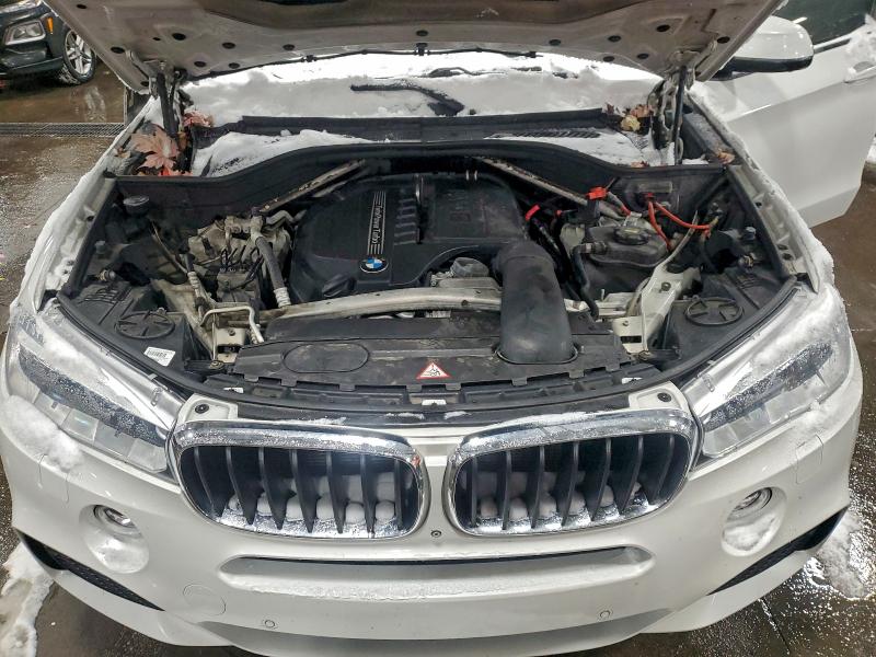 Photo 12 from auction – 2014 BMW X5 XDRIVE3 with VIN 5UXKR0C54E0K44360