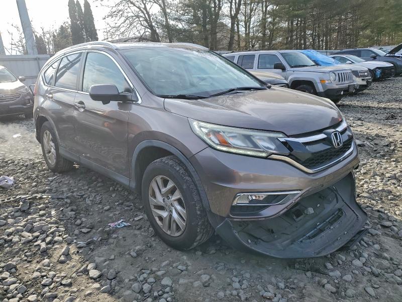 Photo 4 from auction – 2016 HONDA CR-V EXL with VIN 5J6RM4H77GL112916