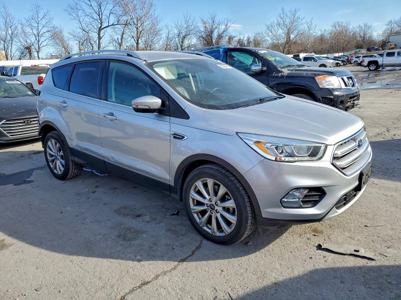 Photo 4 from auction – 2017 FORD ESCAPE TIT with VIN 1FMCU9J91HUB89048