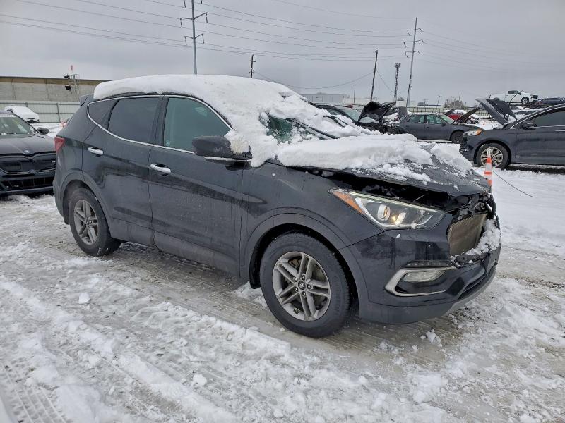 Photo 4 from auction – 2017 HYUNDAI SANTA FE S with VIN 5NMZU3LB9HH021399