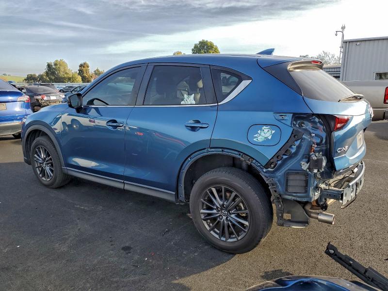 Photo 2 from auction – 2021 MAZDA CX-5 TOURI with VIN JM3KFACM1M0406197