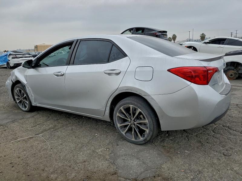 Photo 2 from auction – 2018 TOYOTA COROLLA L with VIN 5YFBURHEXJP765824