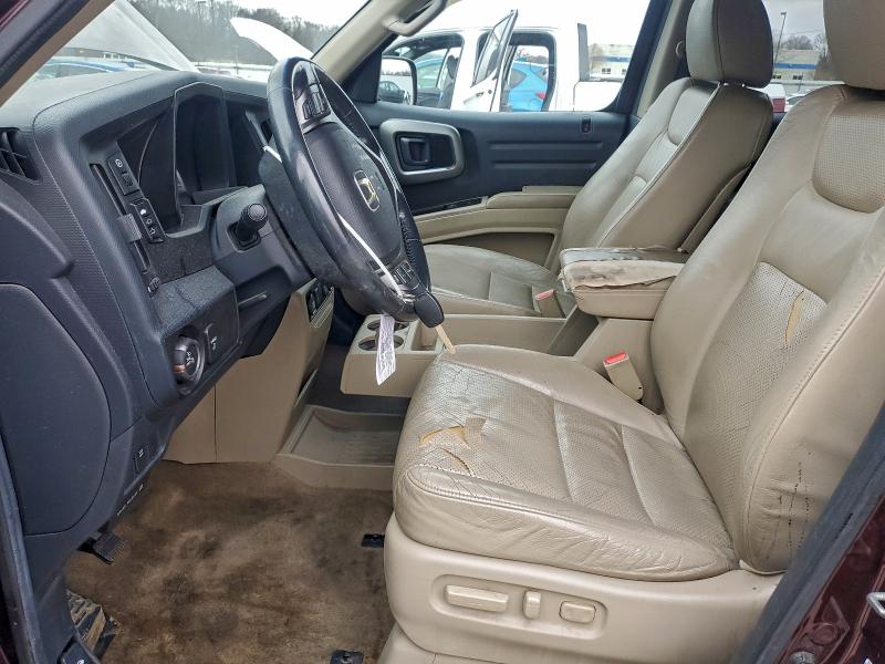 Photo 7 from auction – 2010 HONDA RIDGELINE with VIN 5FPYK1F58AB011523