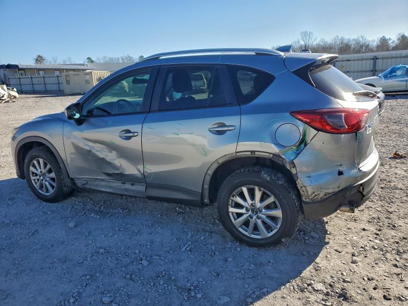 Photo 2 from auction – 2014 MAZDA CX-5 TOURI with VIN JM3KE2CY4E0403369
