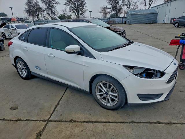 Photo 4 from auction – 2015 FORD FOCUS SE with VIN 1FADP3F21FL300800