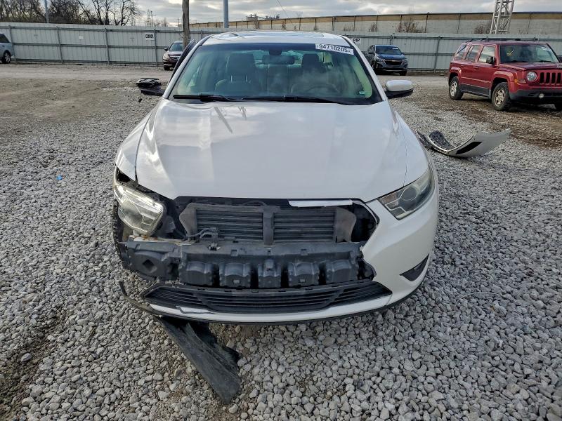 Photo 5 from auction – 2014 FORD TAURUS SEL with VIN 1FAHP2E80EG100290
