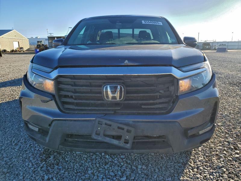 Photo 5 from auction – 2023 HONDA RIDGELINE with VIN 5FPYK3F55PB053488